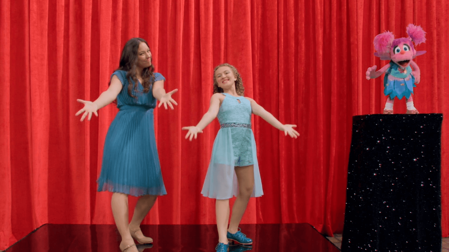 Abby learns how to tap dance with Nina and Charlie.