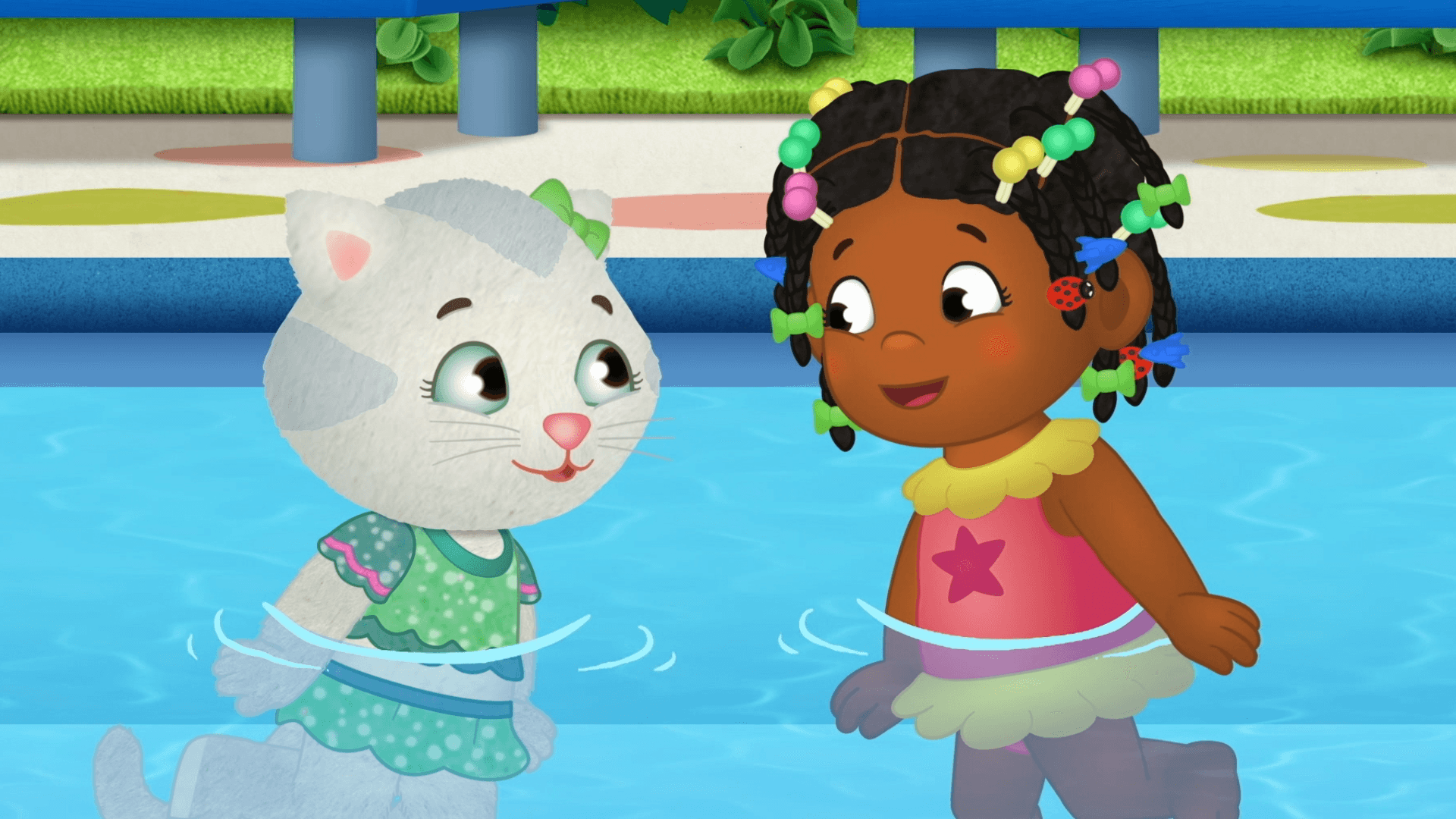 Daniel and his friends want to make a rainbow airplane./Miss Elaina swims across the pool.