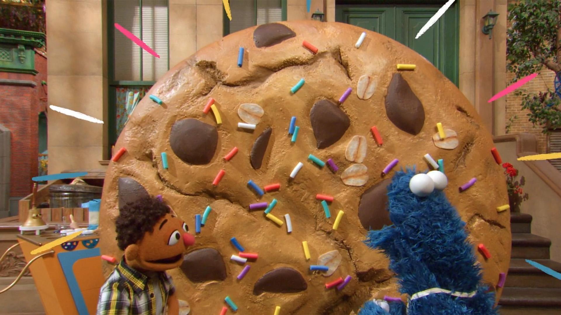 Cookie Monster tries to bake a new cookies for Elmo while Abby and Grover solve a puzzle.